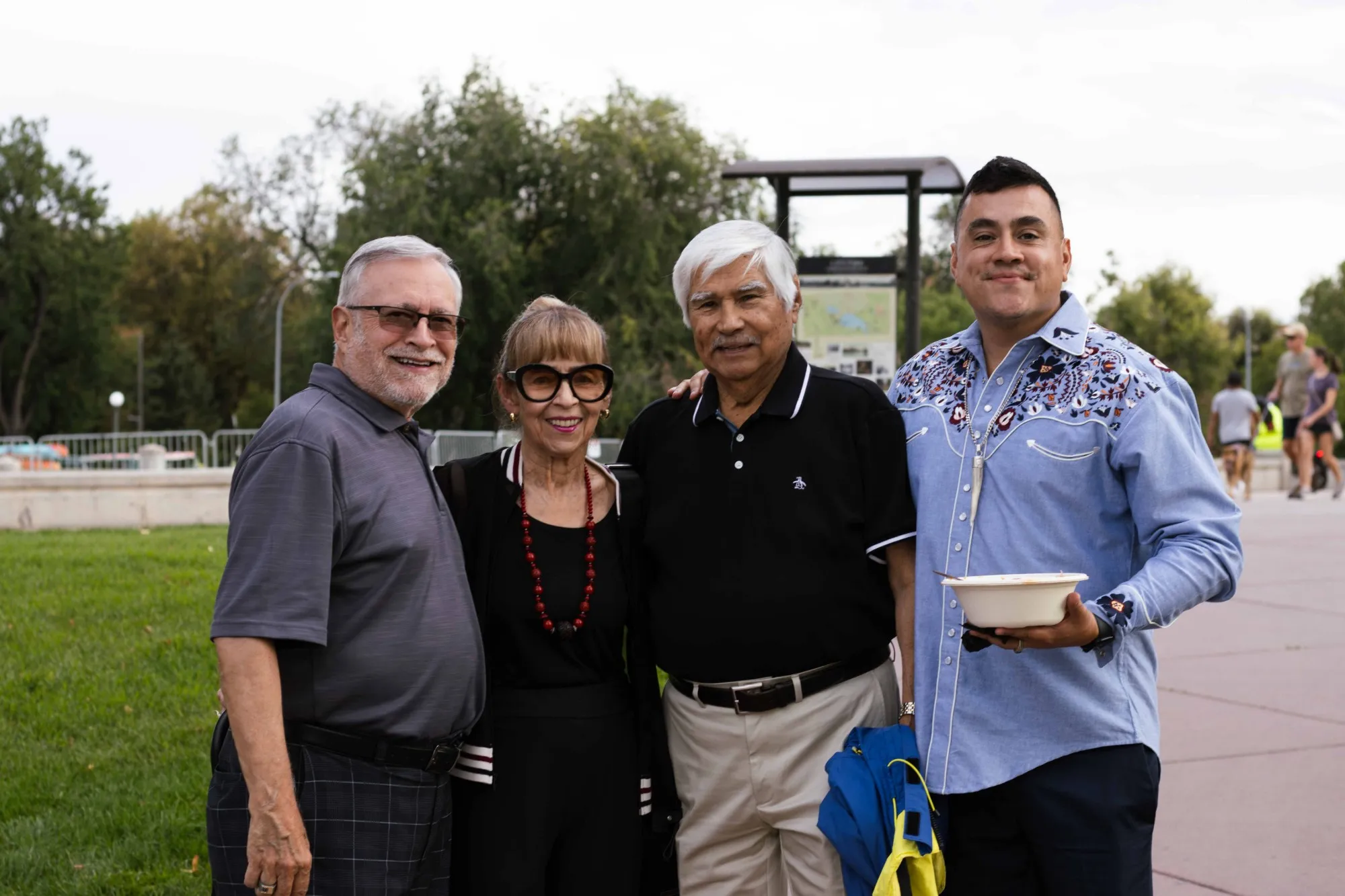 Alfredo Reyes with longtime mentors and neighbors at the kickoff